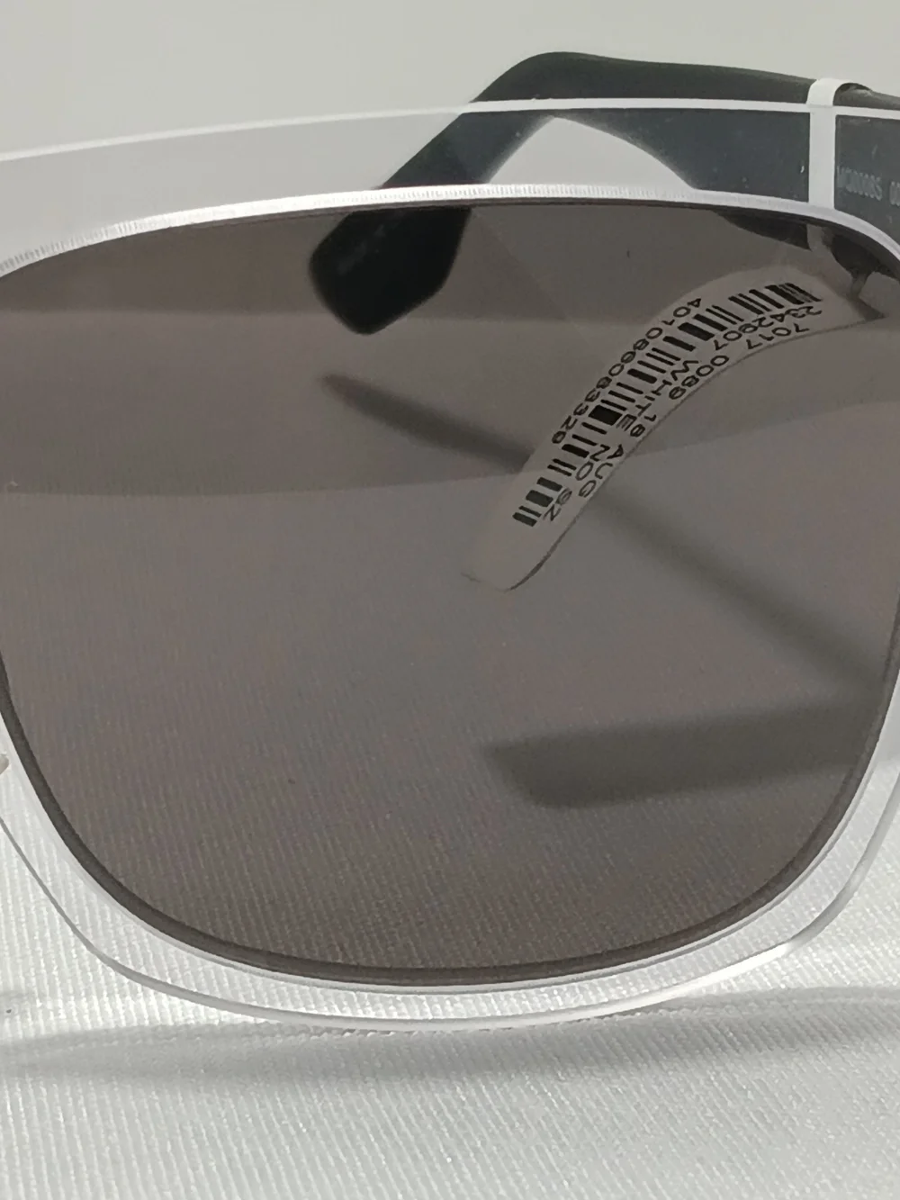McQ by Alexander McQueen Sunglasses Translucent Black Frames Minimalist Preppy
